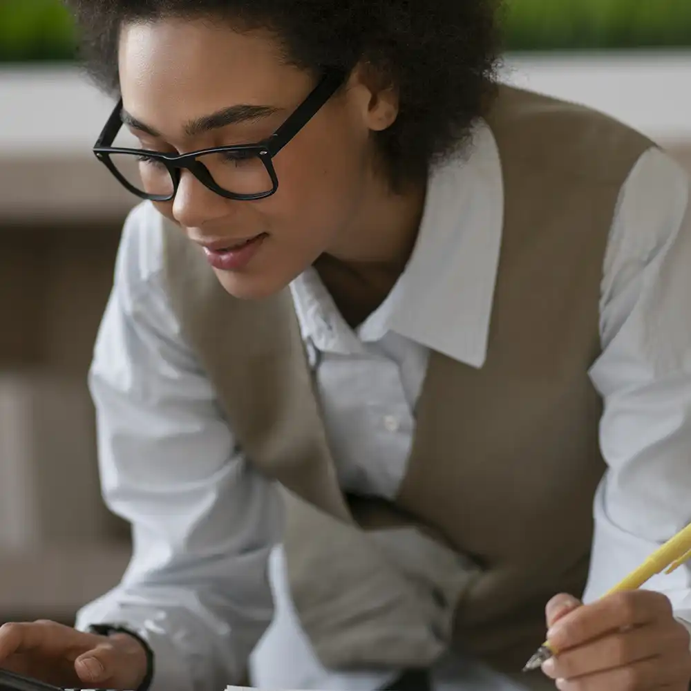 Economics student engages in coursework.