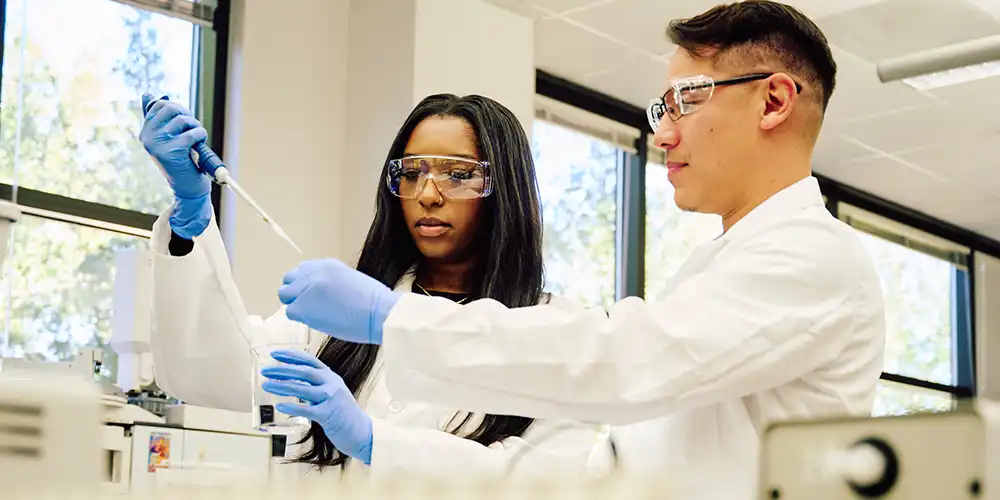 ​​Forensic Science students working in the laboratory.​ 