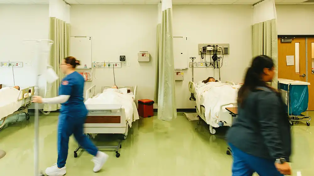 Students walking in lab area