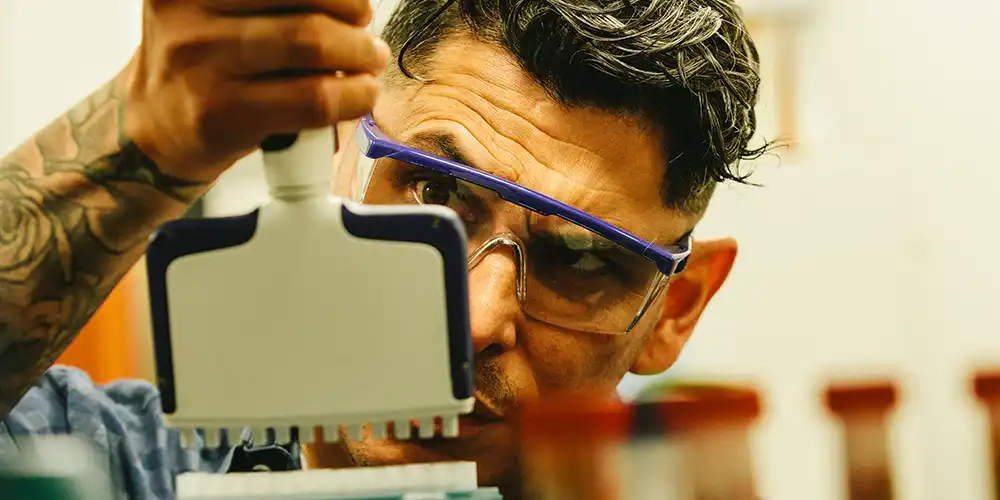 ​​SHSU Student working in a lab​