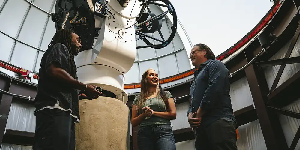 ​​Students and professor at the Dominey Observatory ​ 