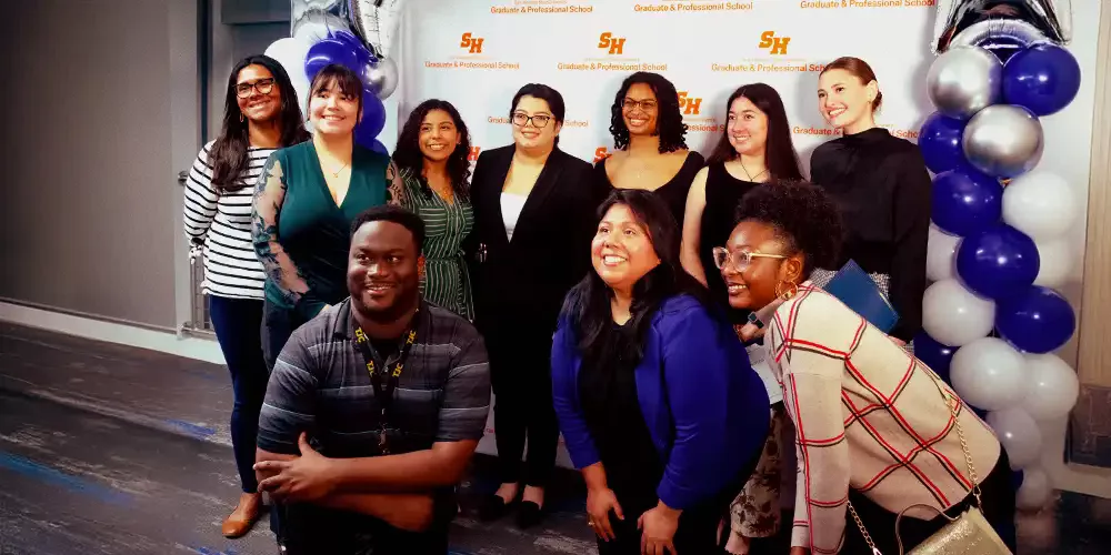 Graduate Students Huddled Together