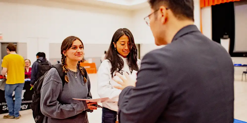 Undergrad students smiling