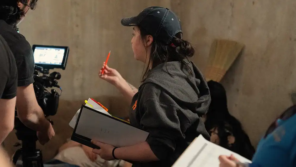 Man in suit talking to another man