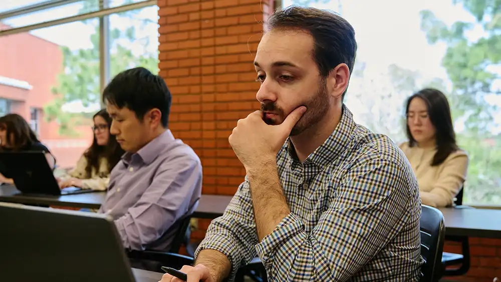 Students sitting together in the learning center.