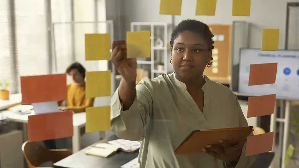 Project Manager mapping out a plan