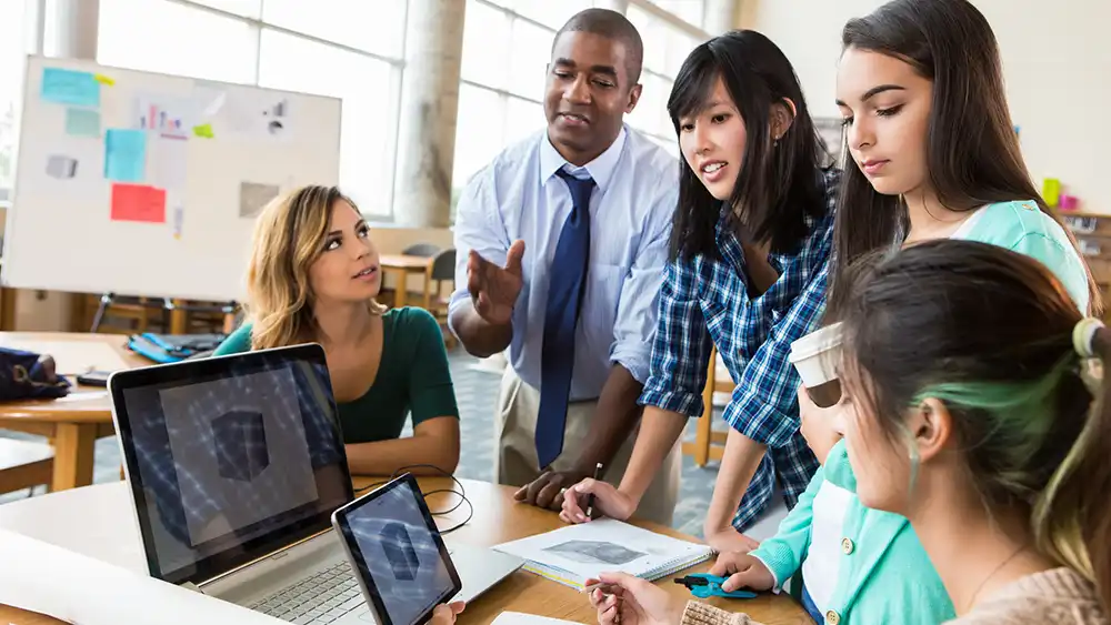 Team working together around a table. 