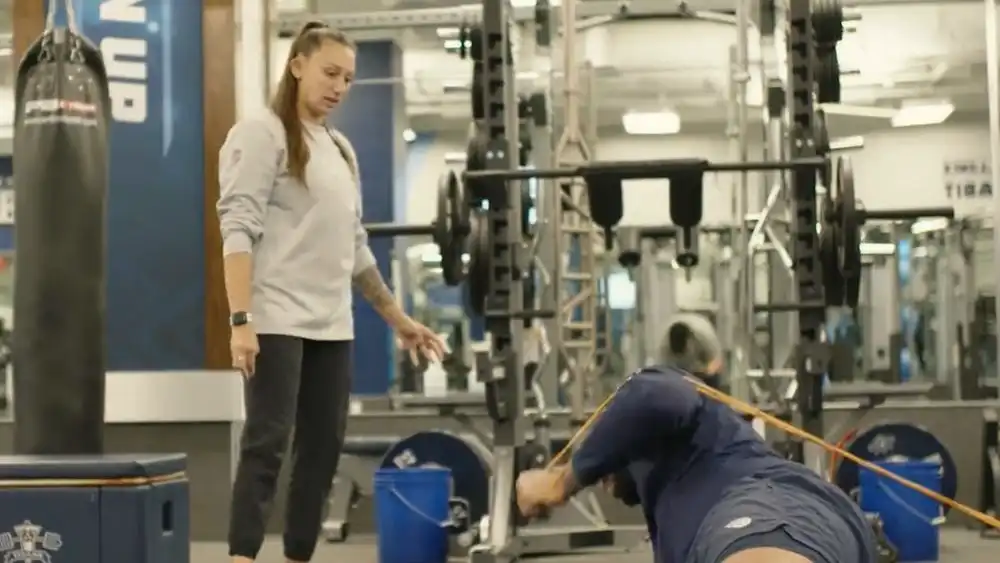 Man in suit talking to another man