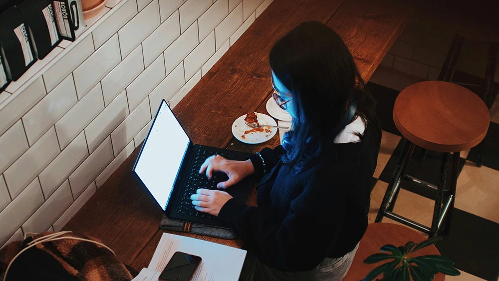 Online Student in Cafe