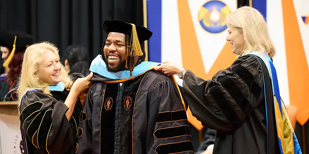 Graduate student at ceremony