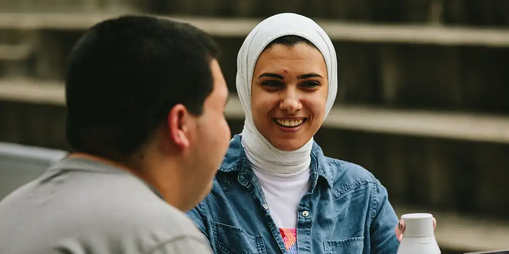 Students at table talking