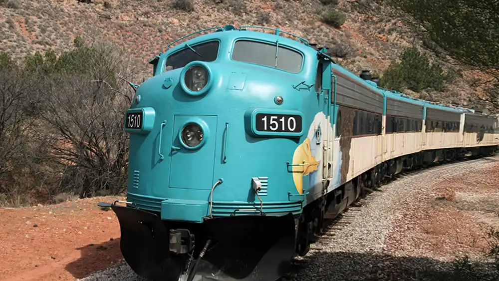 A Verde Canyon Railroad train travels through the Grand Canyon