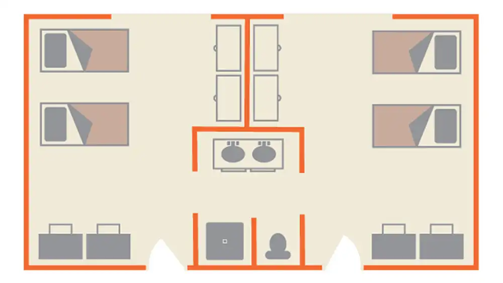 Floor plan layout of an Estill Hall suite at SHSU, showing two double-occupancy bedrooms. Each room contains two beds, desks, and storage. A shared bathroom in the center includes two sinks, a toilet, and a shower. Entrances are located at the bottom of the image. 
