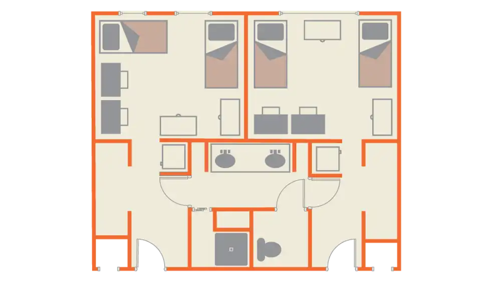 Floor plan of SHSU's Piney Woods Hall featuring three bedrooms, each furnished with a bed and desk. The central area includes two sinks, a toilet, and a shower. A common living area is shown with seating and additional furniture. Orange lines outline the walls and doors throughout the layout.