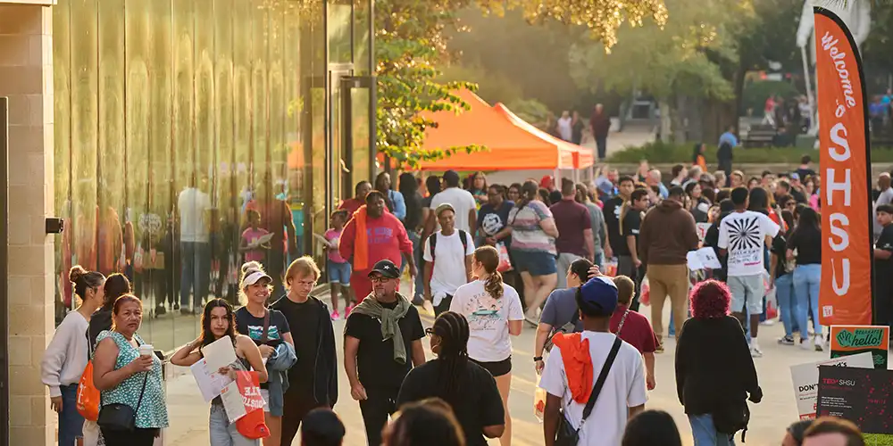 Students walking across campus. 