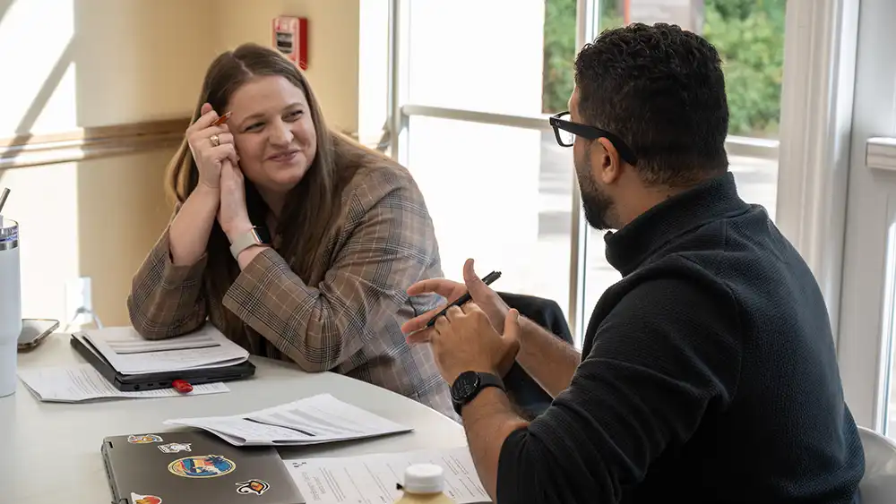 HR specialist speaking to a candidate. 