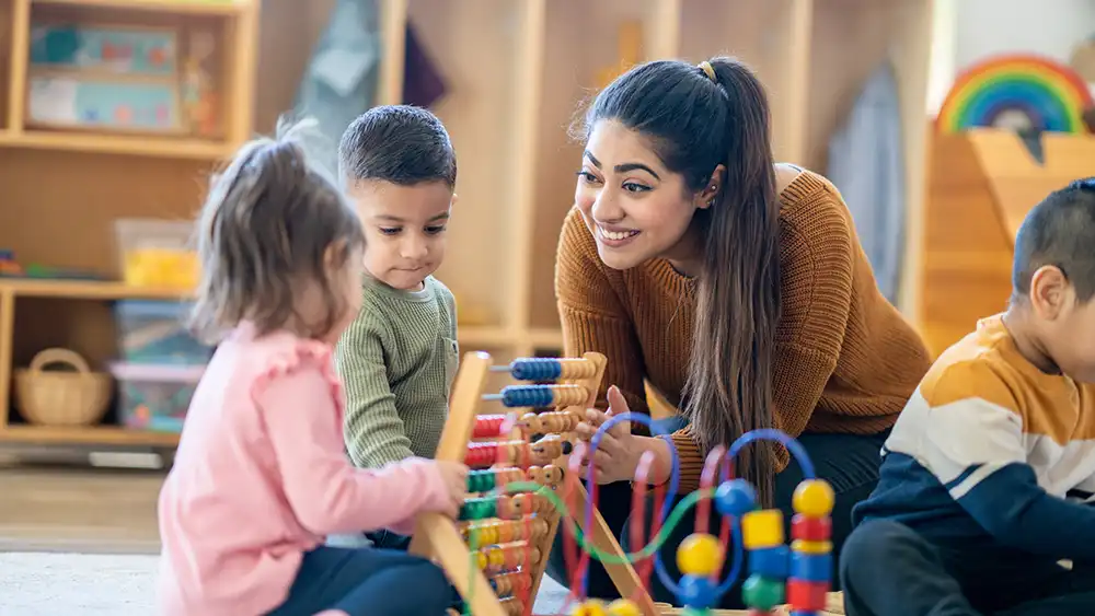 Teacher with small children.