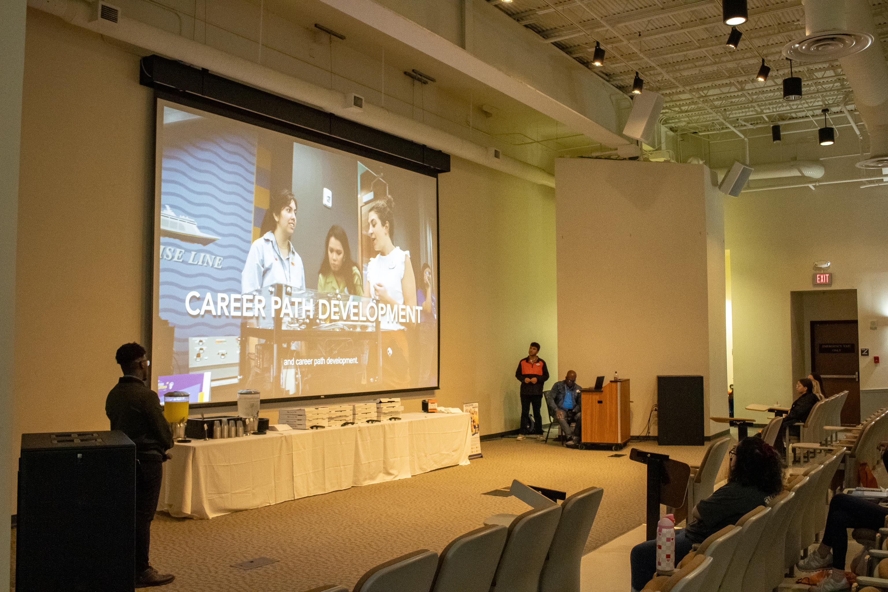 Representatives from Disney presenting information on career opportunities at their Orlando theme park.