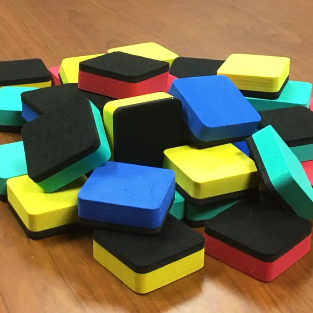 This is a photo of a stack of whiteboard erasers.