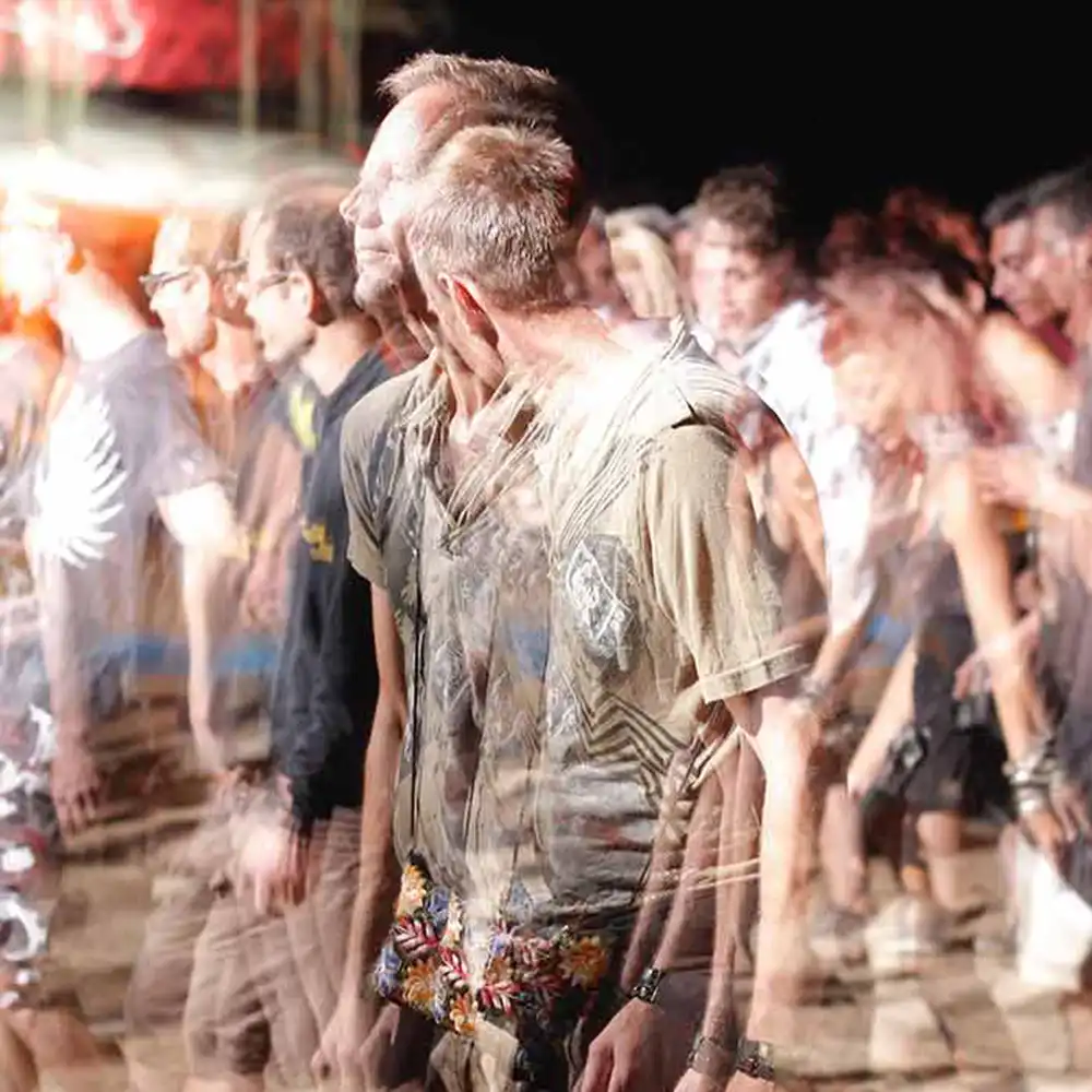 blurry image of party goers representing the sensation of being under the influence