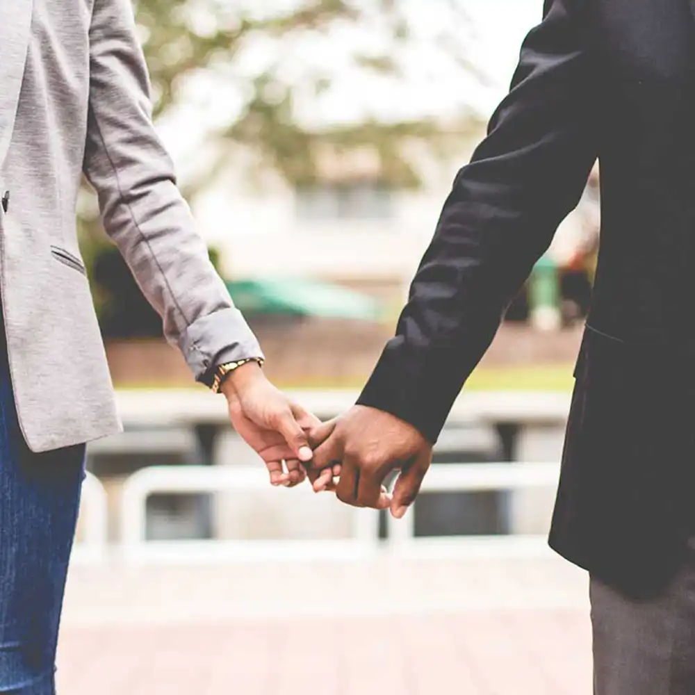 couple holding hands